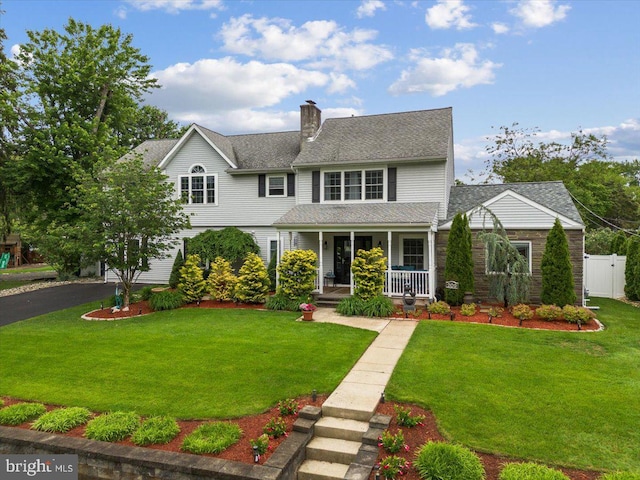 209 Burlington Ave, Voorhees, NJ 08043 - view of front of property with covered porch, a chimney, driveway, a gate, and a shingled roof