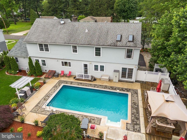 209 Burlington Ave, Voorhees, NJ 08043 - rear view of house with a patio, a fenced backyard, roof with shingles, and an outdoor pool