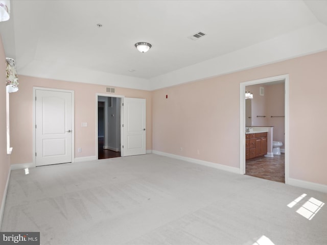 9204 Charleston Dr Unit 407, Manassas, VA 20110 - unfurnished bedroom featuring carpet, baseboards, and ensuite bath