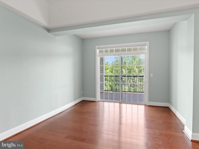 9204 Charleston Dr Unit 407, Manassas, VA 20110 - spare room featuring wood finished floors and baseboards