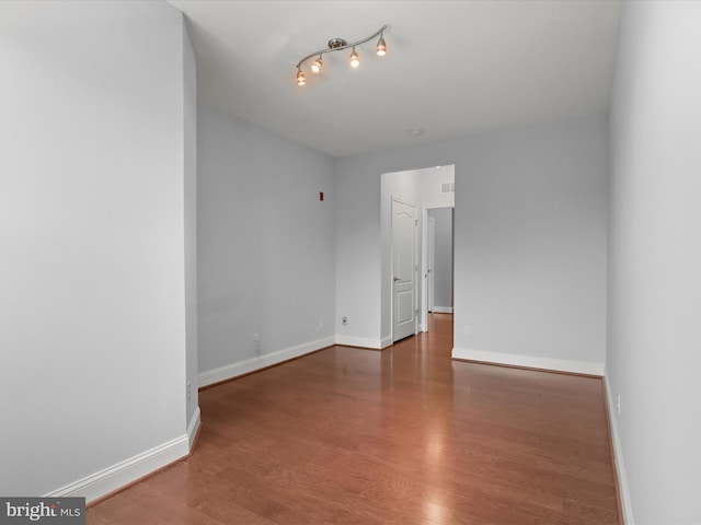 9204 Charleston Dr Unit 407, Manassas, VA 20110 - spare room with wood finished floors and baseboards