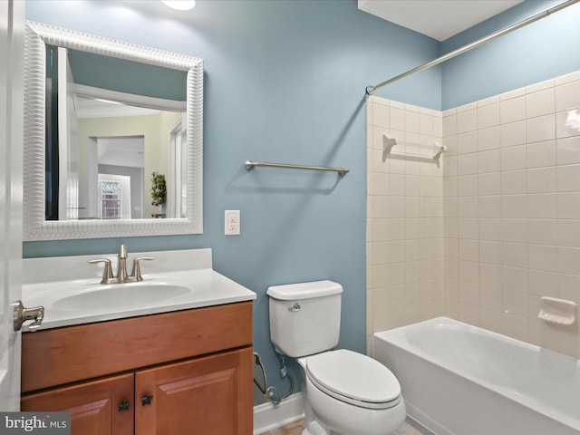 9204 Charleston Dr Unit 407, Manassas, VA 20110 - bathroom featuring toilet, vanity, tub / shower combination, and baseboards