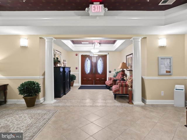 9204 Charleston Dr Unit 407, Manassas, VA 20110 - tiled foyer entrance with a raised ceiling, decorative columns, ornamental molding, and baseboards
