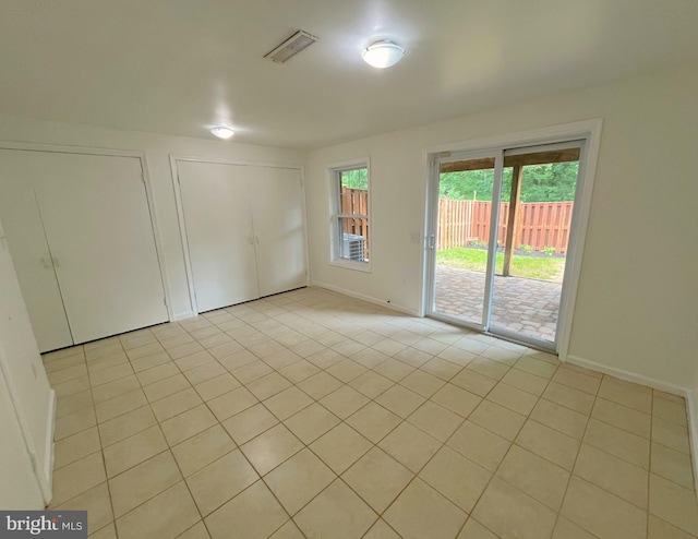 7657 Sheffield Village Ln, Lorton, VA 22079 - unfurnished room featuring light tile patterned flooring and baseboards