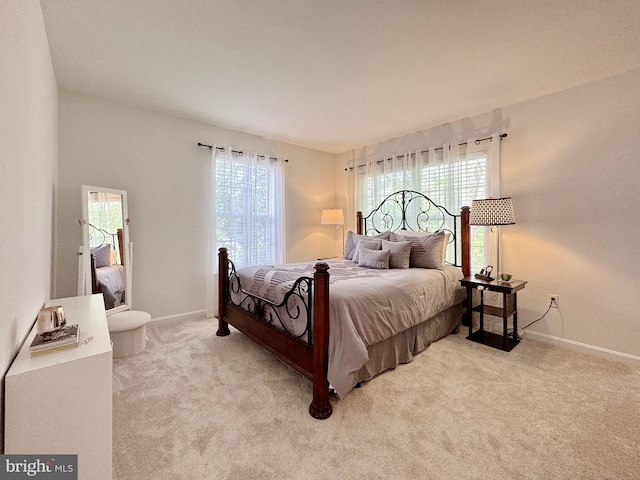 8565 E St, Chesapeake Beach, MD 20732 - bedroom with light colored carpet and baseboards
