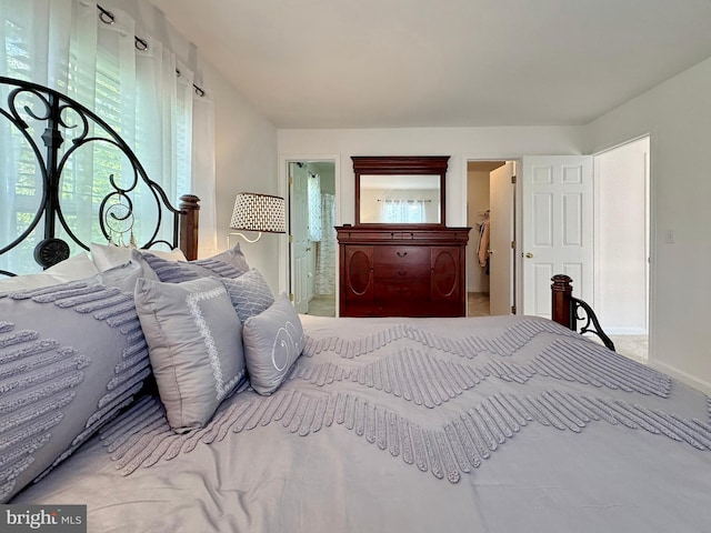 8565 E St, Chesapeake Beach, MD 20732 - bedroom with baseboards, carpet flooring, and ensuite bathroom