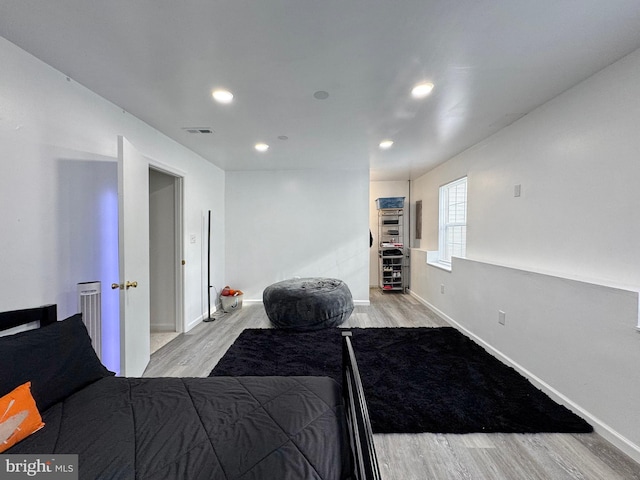 8565 E St, Chesapeake Beach, MD 20732 - bedroom with light wood-style floors, recessed lighting, and baseboards