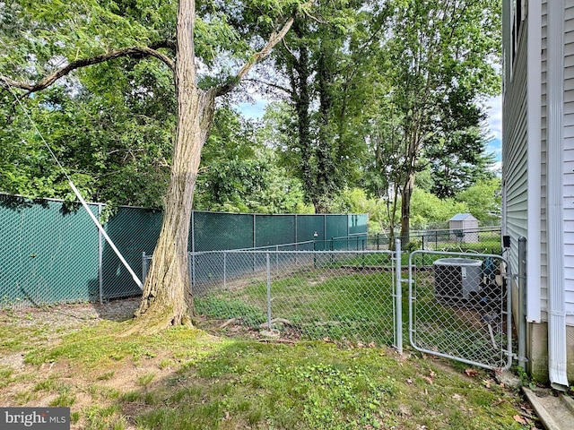 8565 E St, Chesapeake Beach, MD 20732 - view of yard featuring a gate