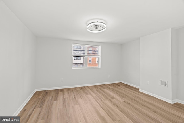 2036 E Huntingdon St, Philadelphia, PA 19125 - spare room featuring light wood-style floors and baseboards
