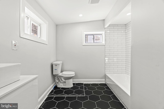 2036 E Huntingdon St, Philadelphia, PA 19125 - full bathroom with vanity, toilet, baseboards, tile patterned floors, and shower / tub combination
