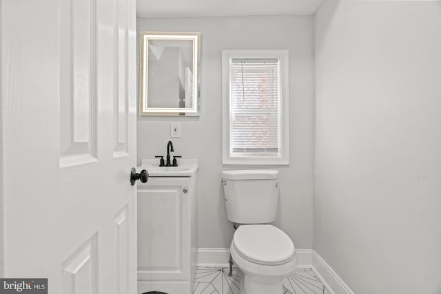 2036 E Huntingdon St, Philadelphia, PA 19125 - bathroom featuring toilet, vanity, and baseboards