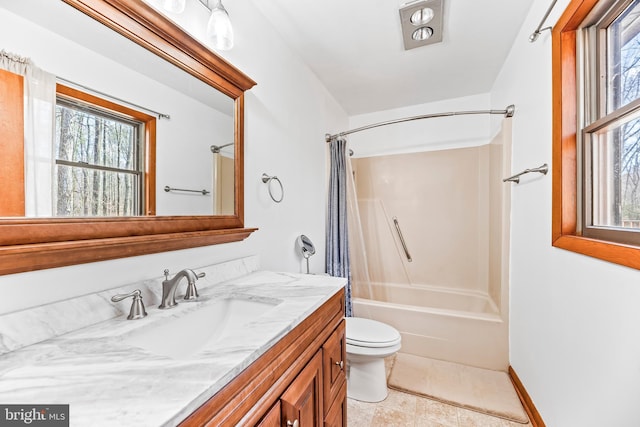 15180 Deborah Dr, Hughesville, MD 20637 - bathroom featuring healthy amount of natural light, vanity, shower / tub combo with curtain, and toilet