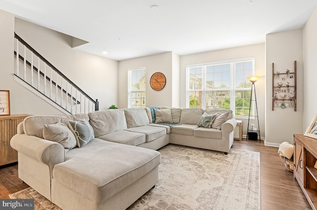1022 Linden Dr, Hanover, MD 21076 - living room with healthy amount of natural light, wood finished floors, baseboards, stairway, and recessed lighting