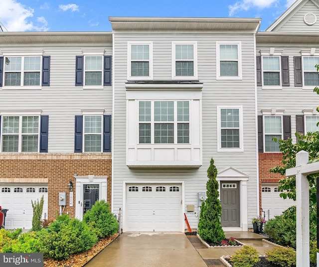 1022 Linden Dr, Hanover, MD 21076 - townhome / multi-family property with a garage and driveway