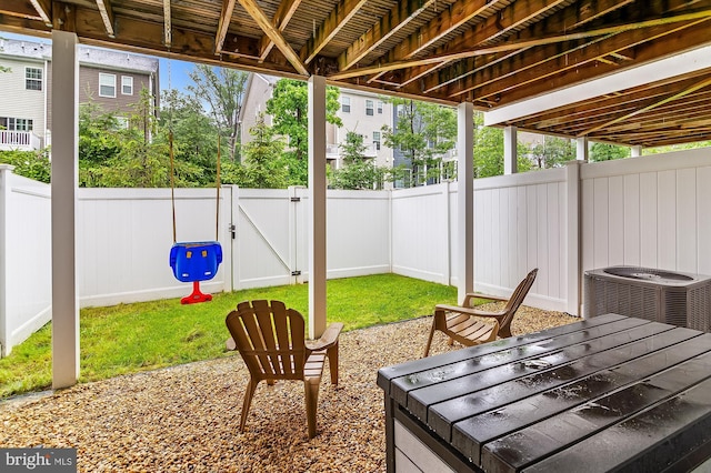 1022 Linden Dr, Hanover, MD 21076 - fenced backyard with a gate, central air condition unit, and a patio area