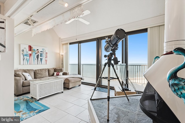 902 Dover House Rd Unit 902S, Bethany Beach, DE 19930 - living room with a ceiling fan, a water view, light tile patterned floors, vaulted ceiling, and track lighting