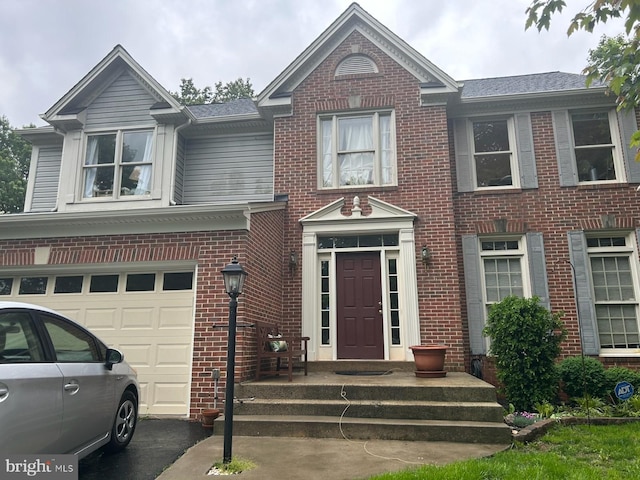 20622 Langford Ct, Sterling, VA 20165 - view of front of home with brick siding and an attached garage