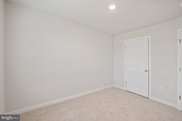 16612 Green Glade Dr, Brandywine, MD 20613 - empty room with light colored carpet, baseboards, and recessed lighting