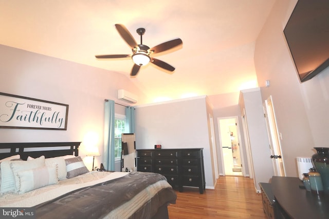 2320 Knotweed Ct, Waldorf, MD 20603 - bedroom featuring wood finished floors, lofted ceiling, a wall mounted air conditioner, and ceiling fan