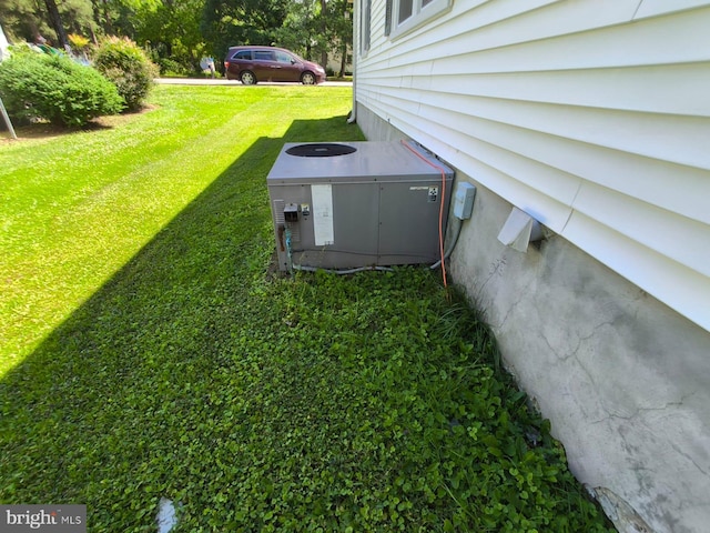 2411 Washington Ave, Victoria, VA 23974 - view of grassy yard featuring central AC
