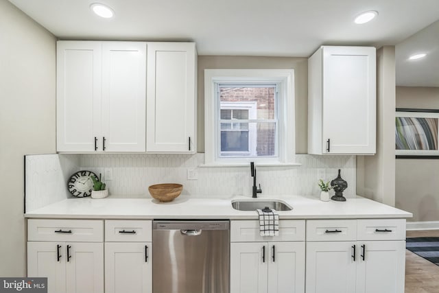 207 W Albanus St, Philadelphia, PA 19120 - kitchen featuring dishwasher, a sink, white cabinetry, light countertops, and recessed lighting