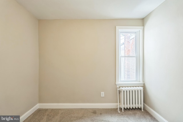 207 W Albanus St, Philadelphia, PA 19120 - spare room featuring radiator, carpet flooring, and baseboards