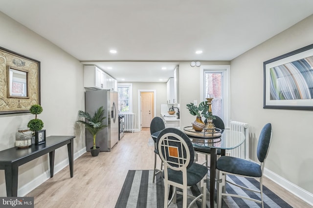 207 W Albanus St, Philadelphia, PA 19120 - dining room with light wood-style floors, baseboards, radiator, and recessed lighting