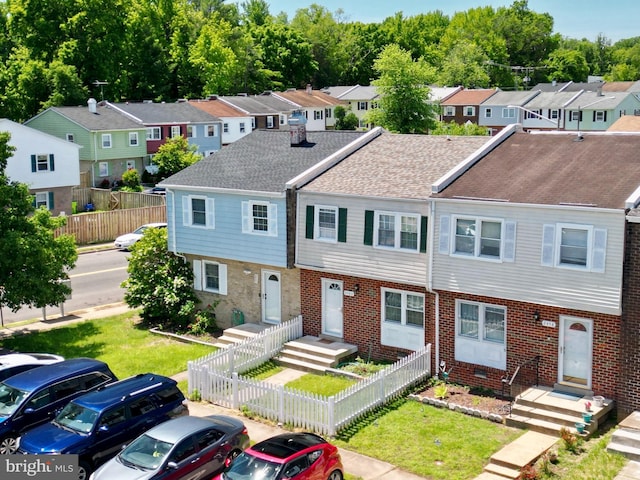 2460 Kilpatrick Pl, Dumfries, VA 22026 - multi unit property with a residential view, brick siding, and roof with shingles