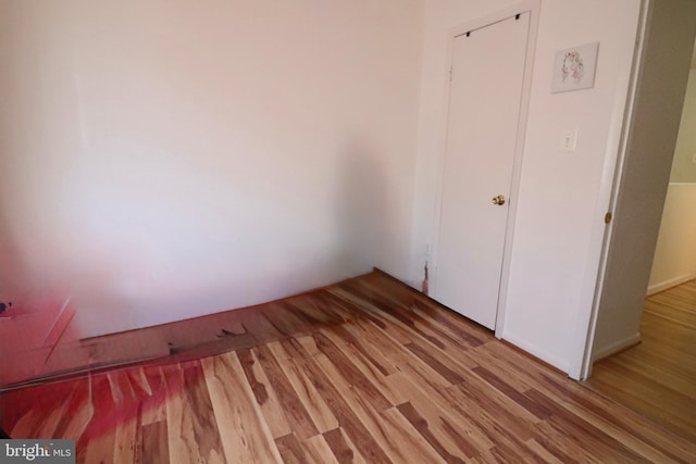 2460 Kilpatrick Pl, Dumfries, VA 22026 - unfurnished bedroom with light wood-type flooring