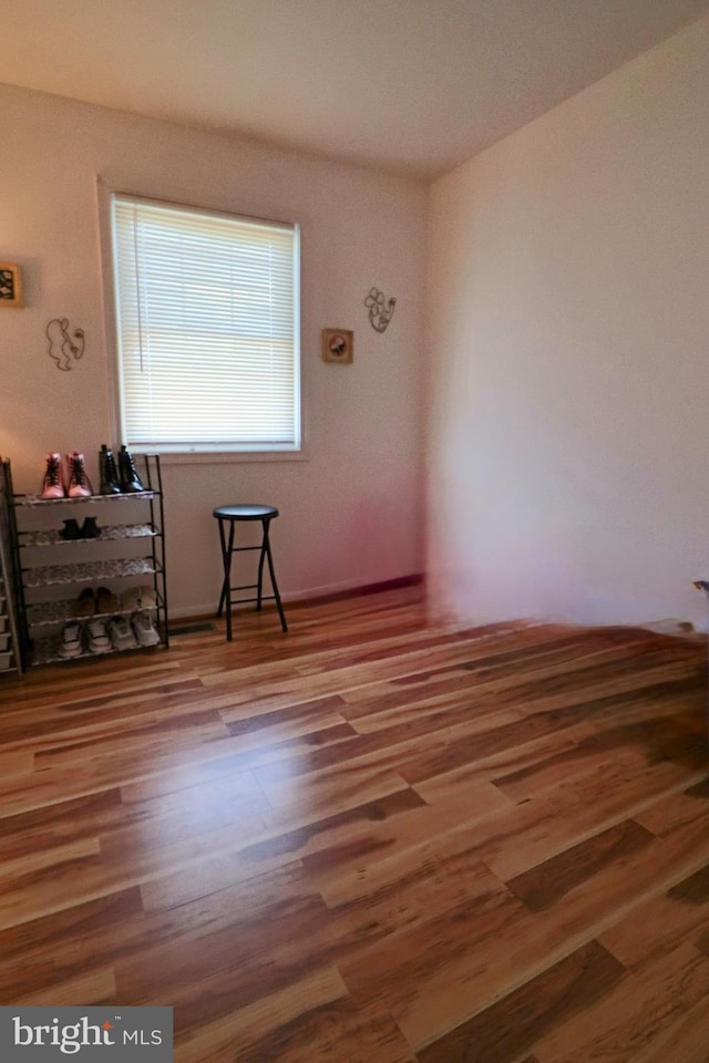 2460 Kilpatrick Pl, Dumfries, VA 22026 - empty room featuring wood finished floors and baseboards