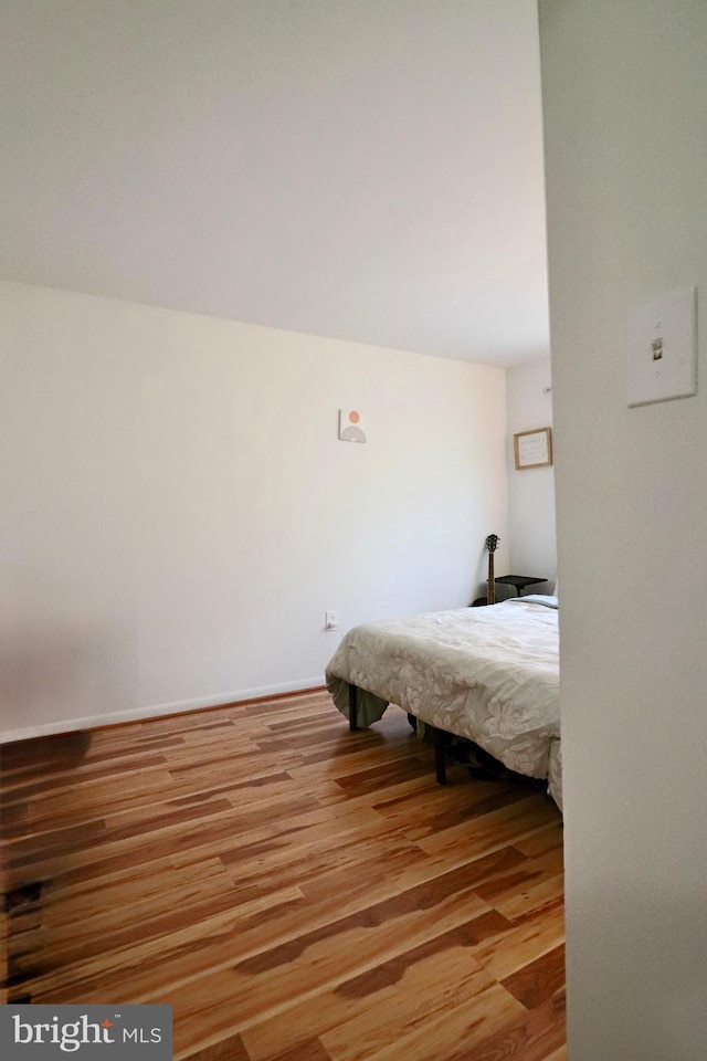 2460 Kilpatrick Pl, Dumfries, VA 22026 - bedroom with wood finished floors and baseboards