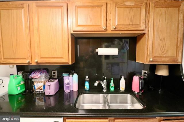 2460 Kilpatrick Pl, Dumfries, VA 22026 - kitchen featuring a sink, light brown cabinets, and dark countertops