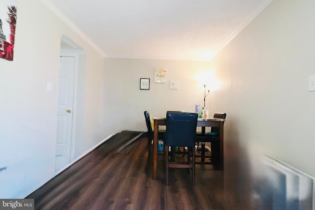 2460 Kilpatrick Pl, Dumfries, VA 22026 - dining room with dark wood-type flooring and crown molding