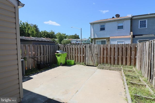 2460 Kilpatrick Pl, Dumfries, VA 22026 - fenced backyard featuring a patio