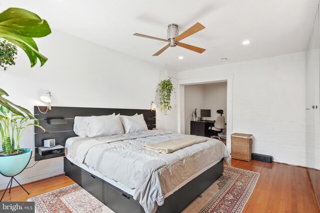 2426 4th St NE, Washington, DC 20002 - bedroom with wood finished floors, an office area, recessed lighting, and a ceiling fan