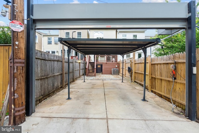 2426 4th St NE, Washington, DC 20002 - view of patio featuring stairway, central AC, and a detached carport