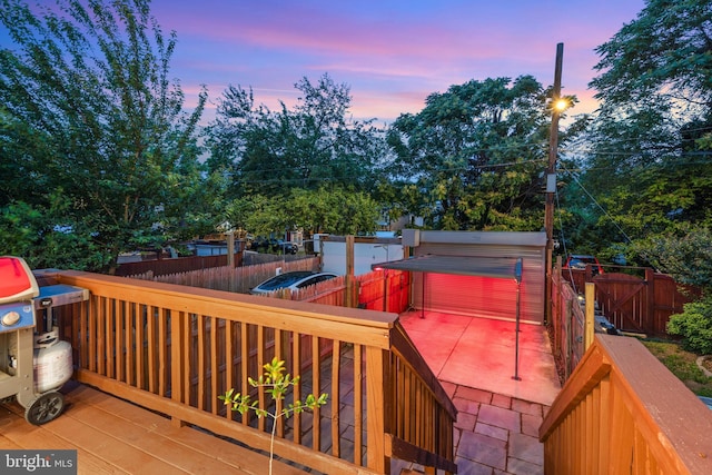 2426 4th St NE, Washington, DC 20002 - deck at dusk with a fenced backyard, a gate, and area for grilling