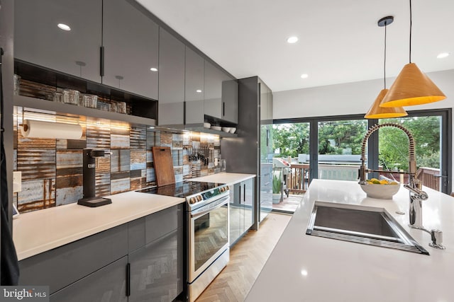 2426 4th St NE, Washington, DC 20002 - kitchen with gray cabinets, electric range, a sink, and recessed lighting