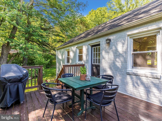 5421 Bartonsville Rd, Frederick, MD 21704 - wooden deck with outdoor dining space and a grill