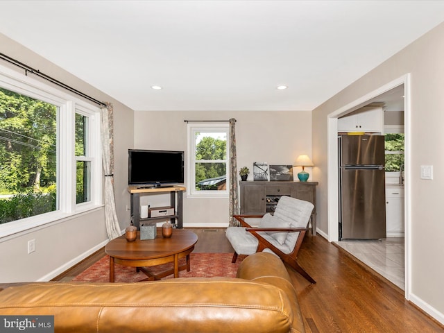 5421 Bartonsville Rd, Frederick, MD 21704 - living area featuring baseboards, wood finished floors, and recessed lighting
