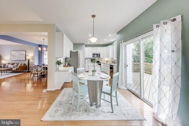 35551 Sarasota St, Round Hill, VA 20141 - dining area with light wood-type flooring, recessed lighting, and a chandelier