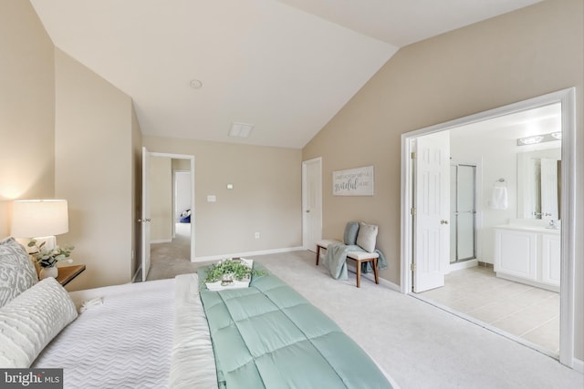 35551 Sarasota St, Round Hill, VA 20141 - bedroom featuring light colored carpet, vaulted ceiling, baseboards, and connected bathroom