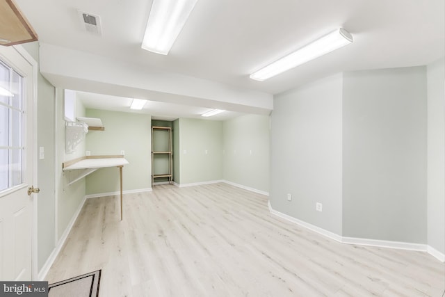 35551 Sarasota St, Round Hill, VA 20141 - finished basement featuring light wood-style floors and baseboards