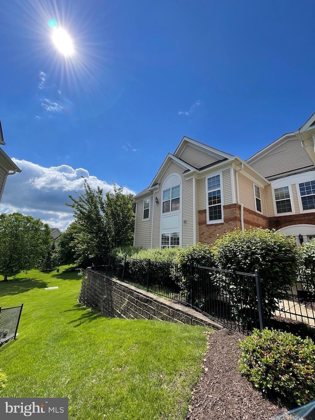 43825 Hickory Corner Ter Unit 104, Ashburn, VA 20147 - back of house featuring brick siding