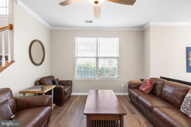 43825 Hickory Corner Ter Unit 104, Ashburn, VA 20147 - living room featuring wood finished floors, ornamental molding, ceiling fan, baseboards, and stairway