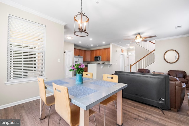 43825 Hickory Corner Ter Unit 104, Ashburn, VA 20147 - dining area featuring crown molding, stairway, light wood-style flooring, a ceiling fan, and recessed lighting
