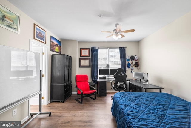 43825 Hickory Corner Ter Unit 104, Ashburn, VA 20147 - bedroom featuring wood finished floors, baseboards, and ceiling fan