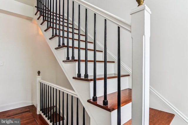 1157 Riverside Ave, Baltimore, MD 21230 - staircase featuring wood finished floors and baseboards