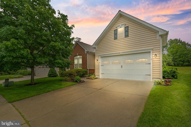 4 Hearthstone Blvd, Pemberton, NJ 08068 - traditional-style home with concrete driveway, a front lawn, brick siding, and a garage