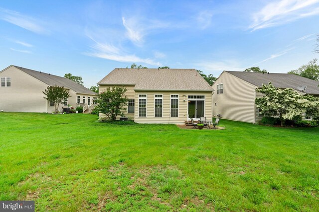 4 Hearthstone Blvd, Pemberton, NJ 08068 - rear view of property with a lawn